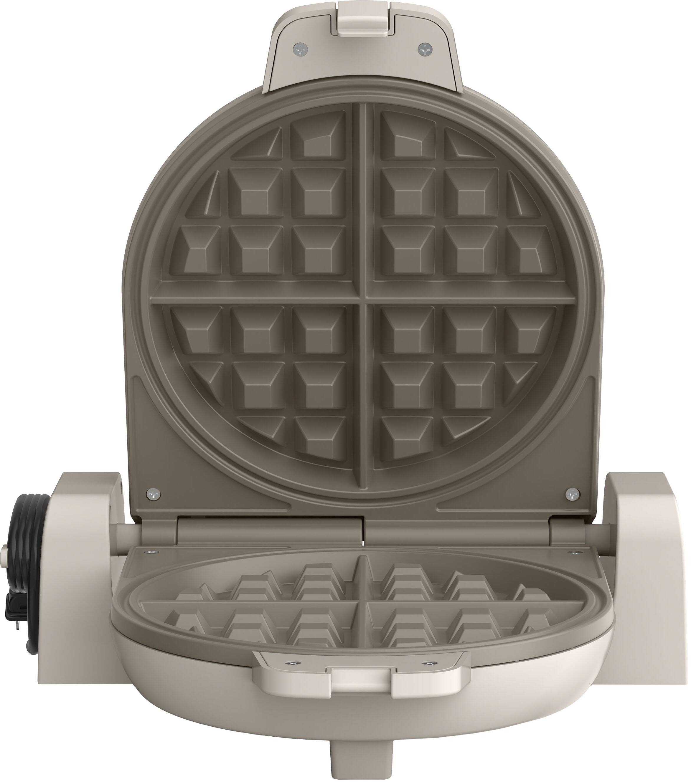 Angle. Bella - Fits-anywhere Kitchenware: Flip & Store Belgian Waffle Maker - Oatmilk.
