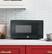 Alt View 11. GE - 0.7 Cu. Ft. Spacemaker Countertop Microwave Oven - Black on Black.