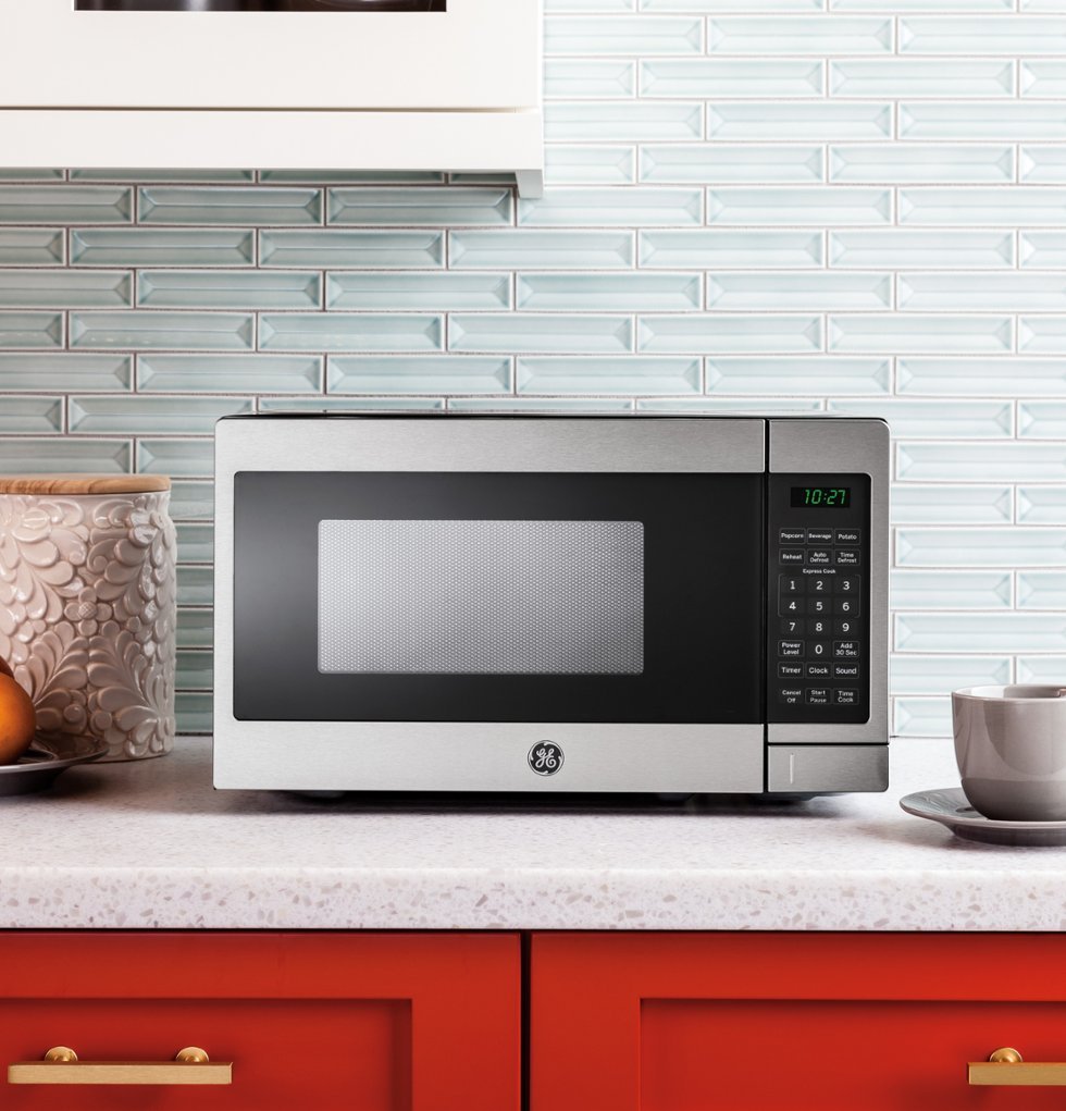 Zoom in on Alt View Zoom 13. GE - 0.7 Cu. Ft. Spacemaker Countertop Microwave Oven - Stainless steel.