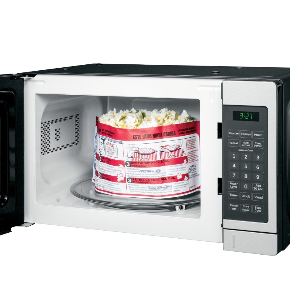 Zoom in on Alt View Zoom 14. GE - 0.7 Cu. Ft. Spacemaker Countertop Microwave Oven - Stainless steel.