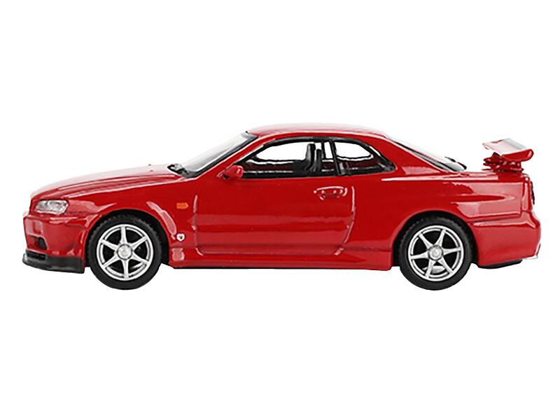 Angle. Mini GT - Nissan Skyline GT-R (R34) V-Spec RHD (Right Hand Drive) Active Red Limited Edition 1/64 Diecast Model Car by Mini GT - Red.