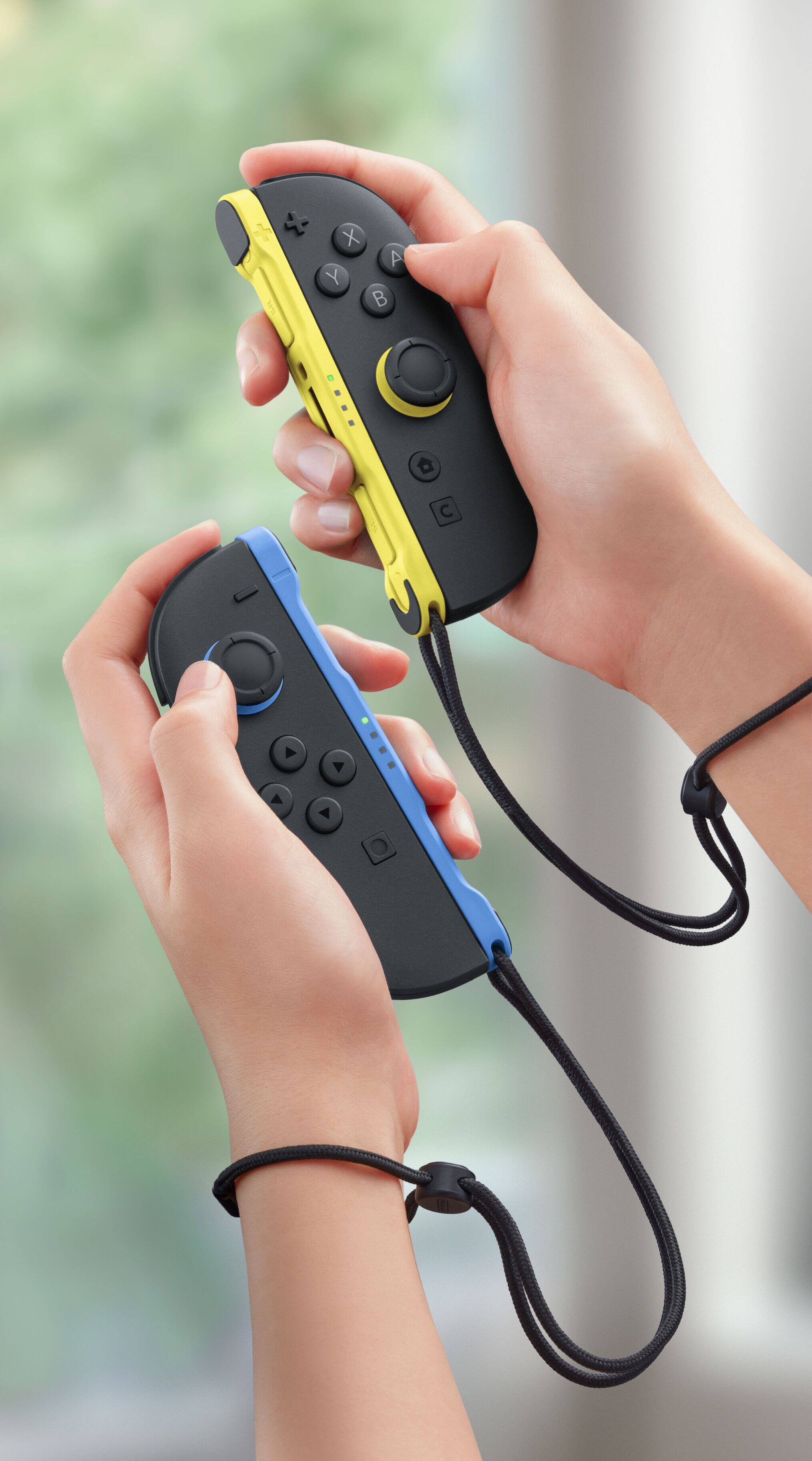 Alt View 7. Nintendo - Joy-Con 2 (L)/(R) Blue / Light Yellow - Black.