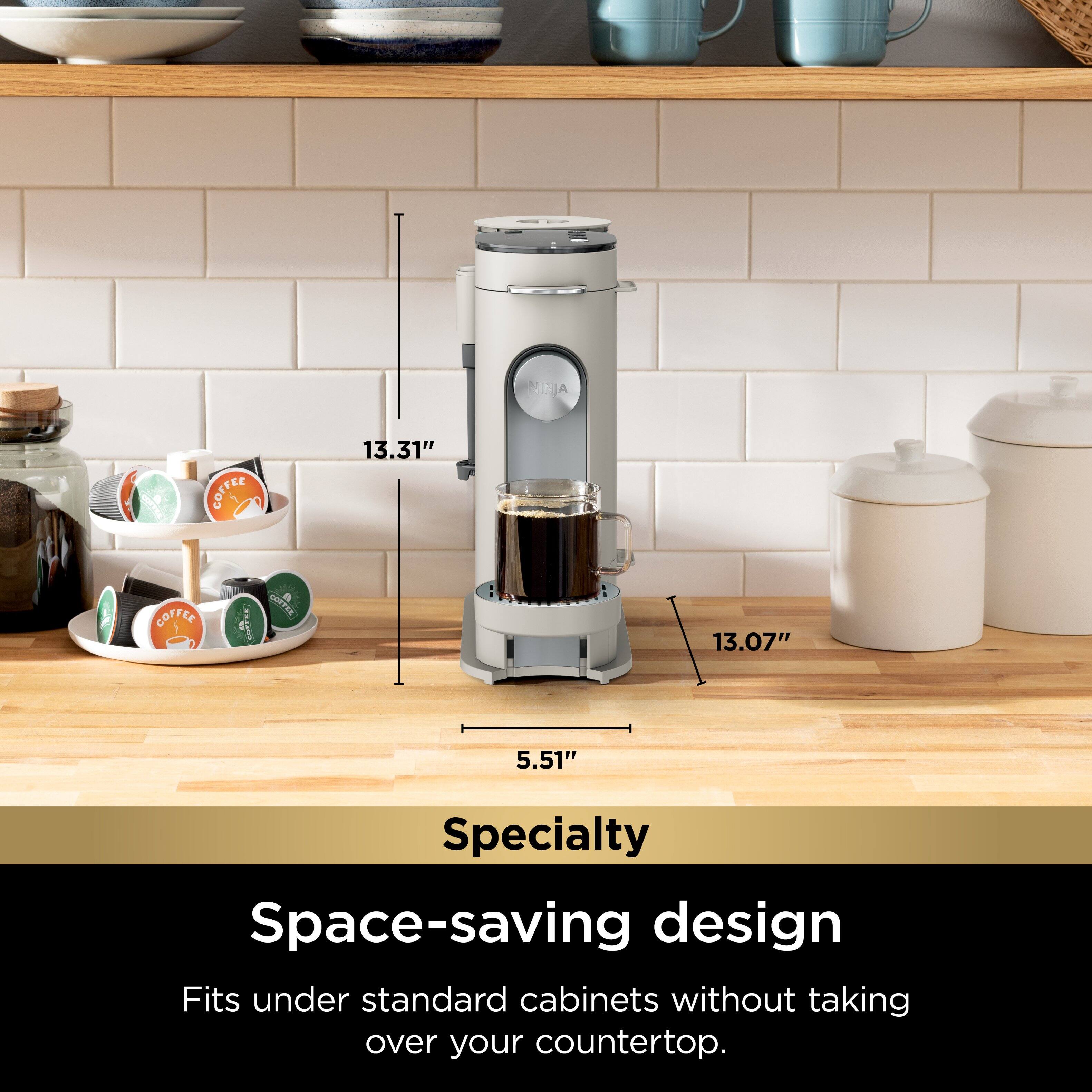 The text on the image reads: "JA FasaOo COFFEE 13.31" COFFEE o Sd a Thaaun 13.07" 5.51" Specialty Space-saving design Fits under standard cabinets without taking over your countertop."