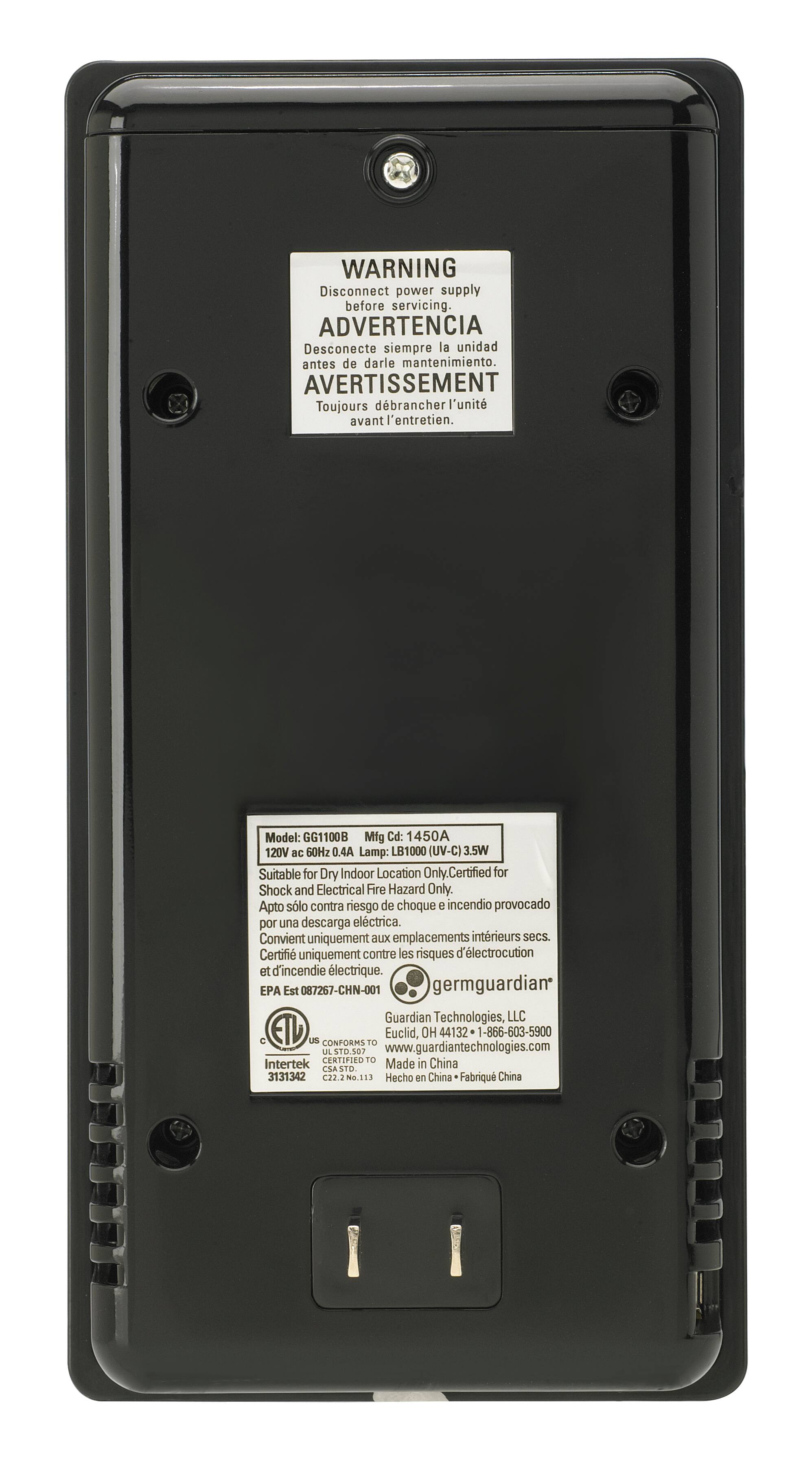 The image features a black electrical device with a warning label on it. The label states "Disconnect power supply before servicing" in English and "Desconecte siempre la unidad antes de darle mantenimiento" in Spanish. The device is suitable for dry indoor locations only and is certified for shock and electrical fire hazard only. The label also includes information about the manufacturer, model, and a website address.