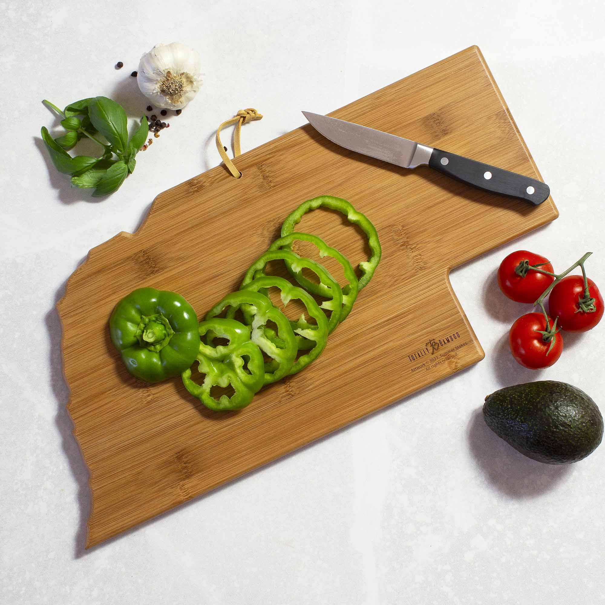 The text on the image reads:

"Willow Creek
Handcrafted in the USA
www.willowcreekcuttingboards.com"