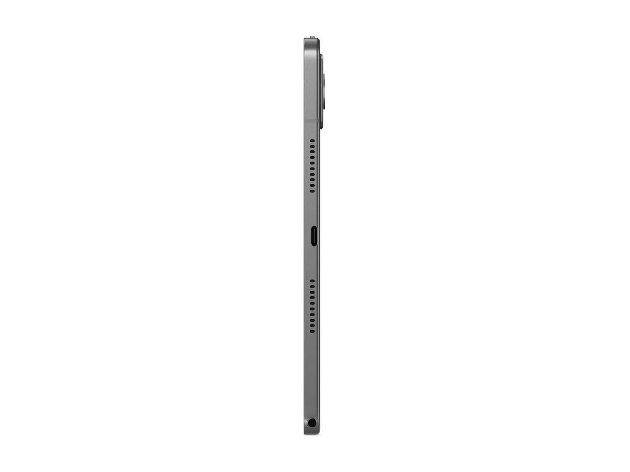 The image shows a sleek, metallic device with a vertical orientation. It has a series of small holes on both sides, possibly for ventilation or sound output. There is a small button or switch near the top, and a circular port at the bottom, which could be a charging port or a headphone jack.