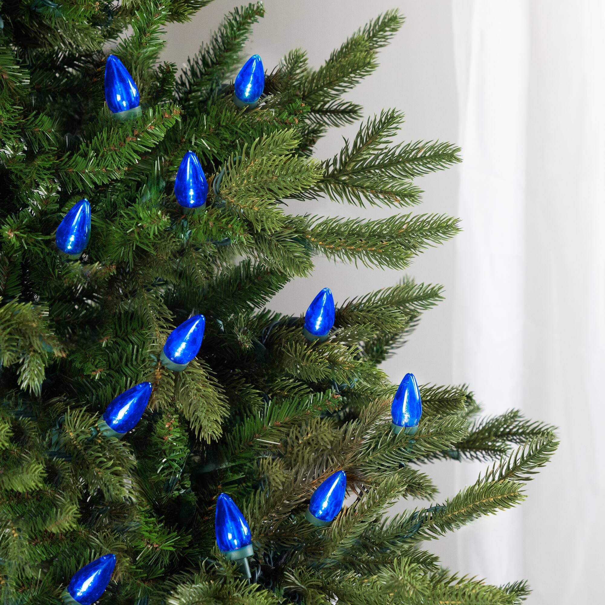 Alt View 3. Northlight - LED C7 Christmas Lights - Blue - 17' Green Wire - 25ct - Blue.