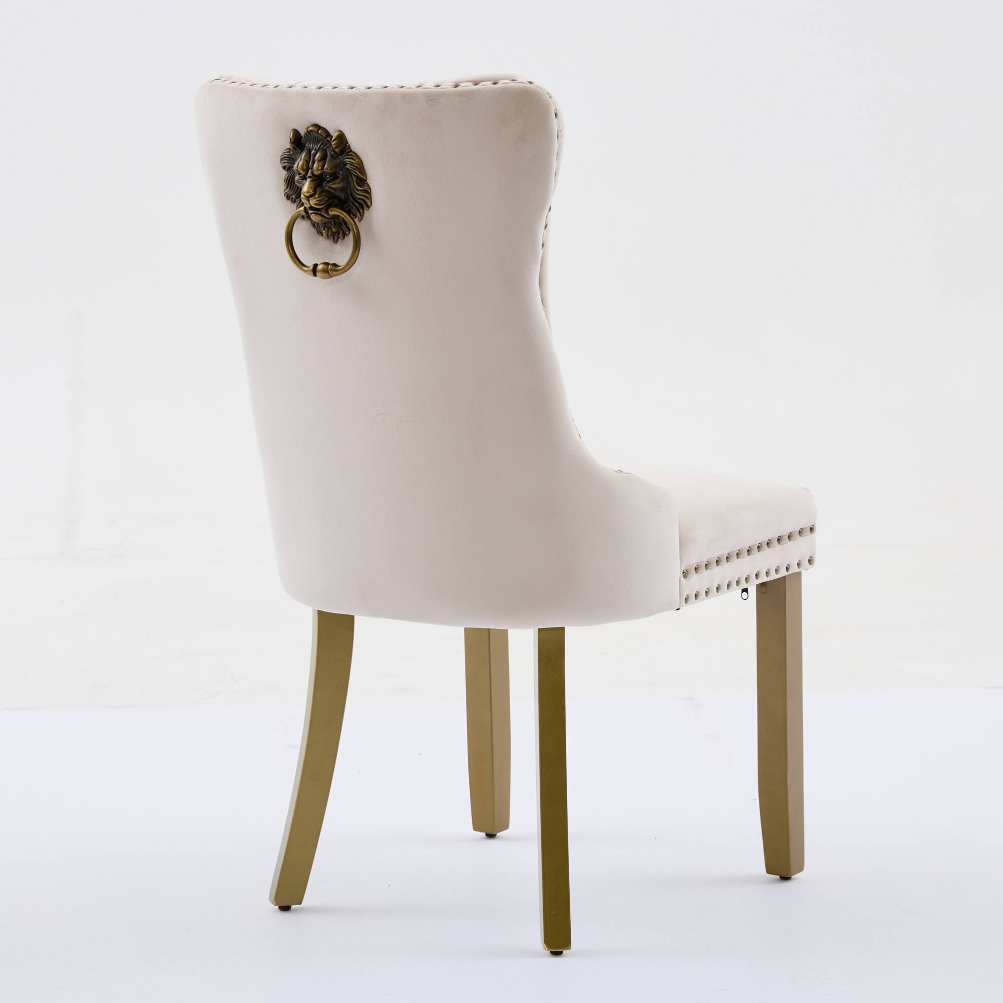 Alt View 2. GOODSILO - Modern Tufted Velvet Dining Chairs with Lion Head Pull Rings and Golden Wooden Legs, Set of 2 - Beige.