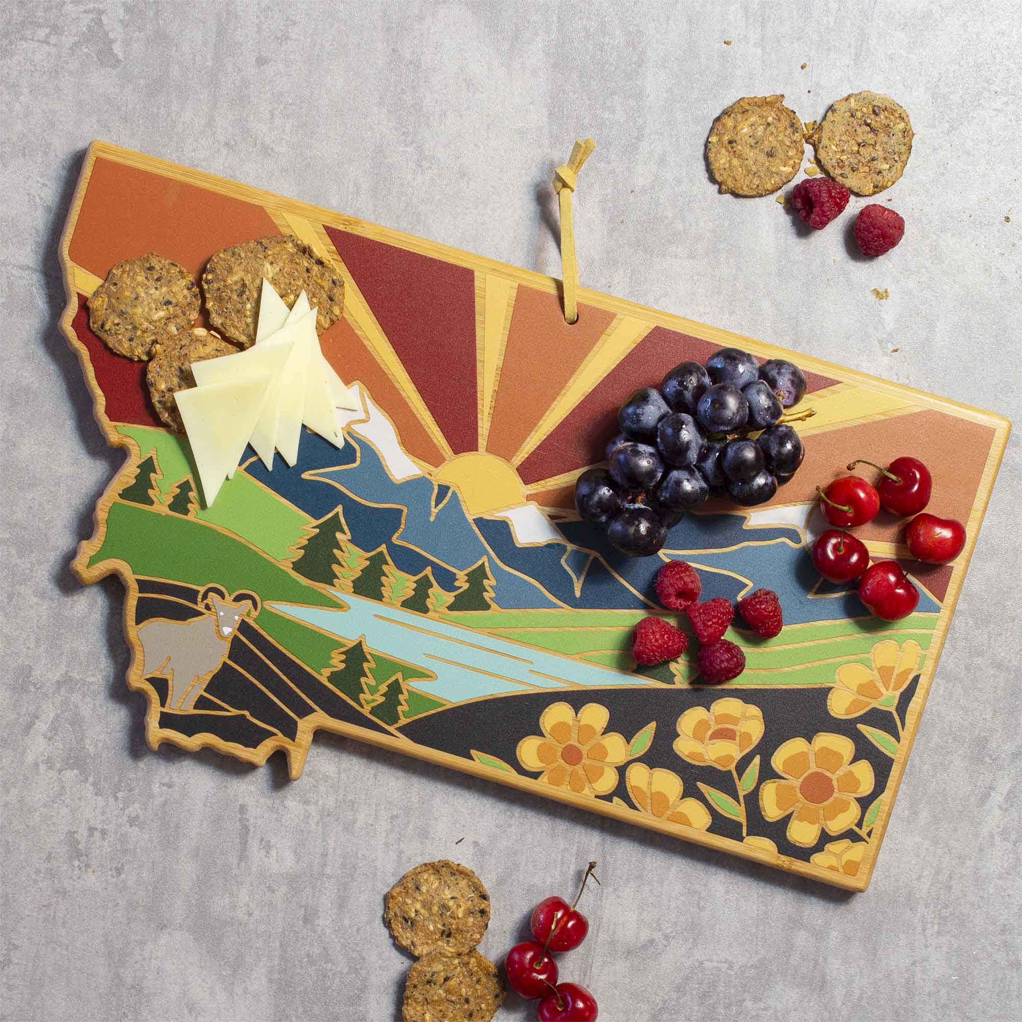 Angle. Totally Bamboo - Montana Cutting Board with Artwork by Summer Stokes.