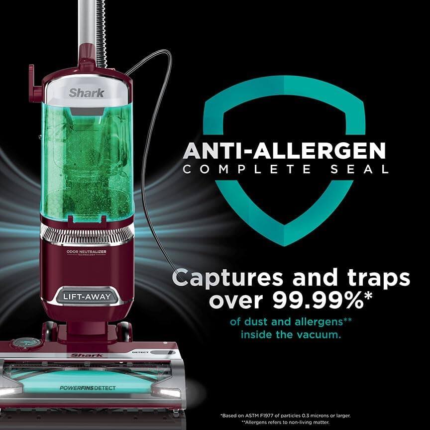 Shark ANTI-ALLERGEN COMPLETE SEAL ODOR NEUTRALIZER Captures and traps over 99.99%* of dust and allergens** inside the vacuum. Shark POWERFINS DETECT "Based on ASTM F1977 of particles 0.3 microns or larger. **Allergens refers to non-living matter.