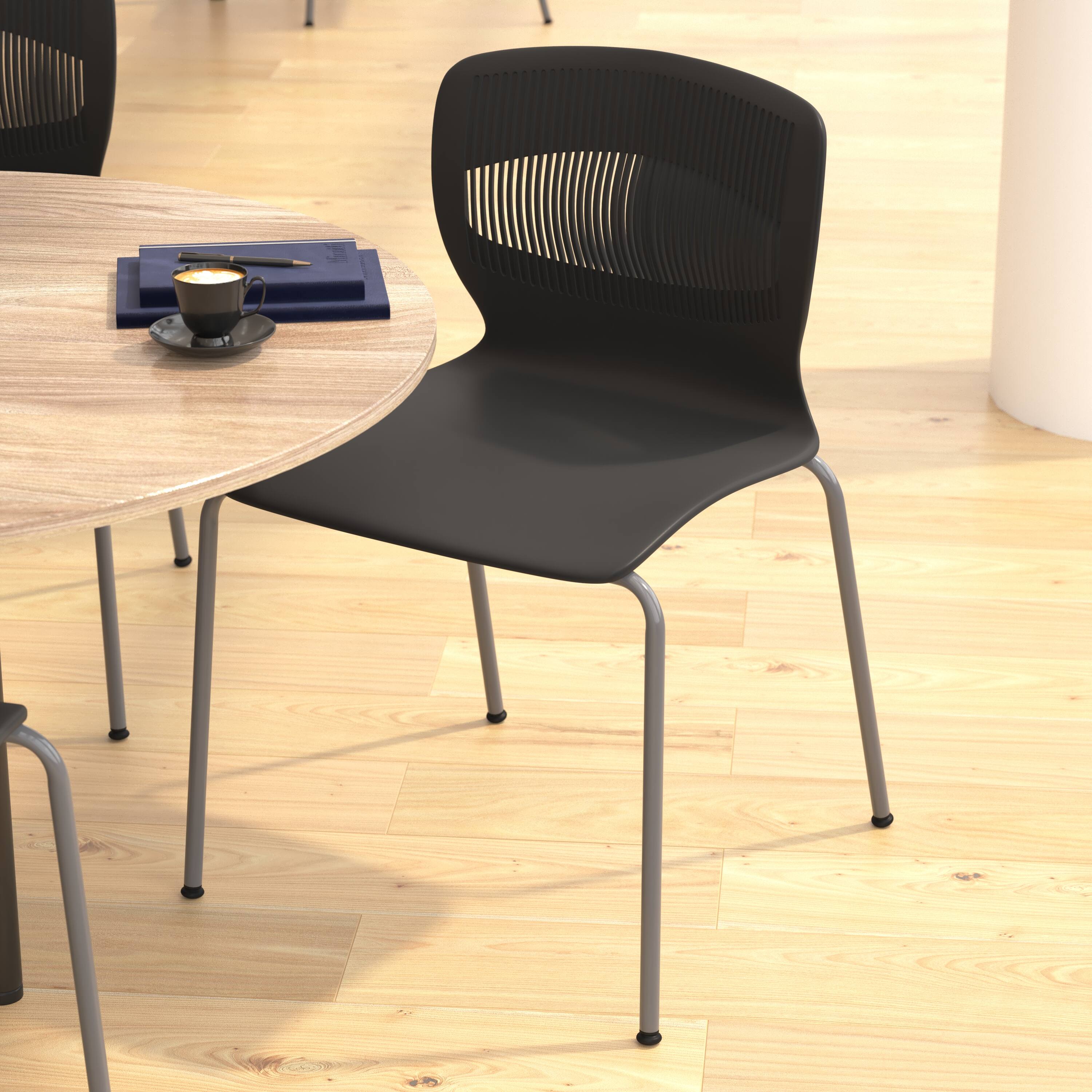 Alt View 3. Emma + Oliver - Arcana Series Heavy Duty 770 lb. Capacity Ergonomic Polypropylene Stack Chair with Lumbar Support and Steel Frame - Black.