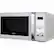 Left. Bella - 0.7 Cu. Ft. Compact Microwave - White with Chrome.