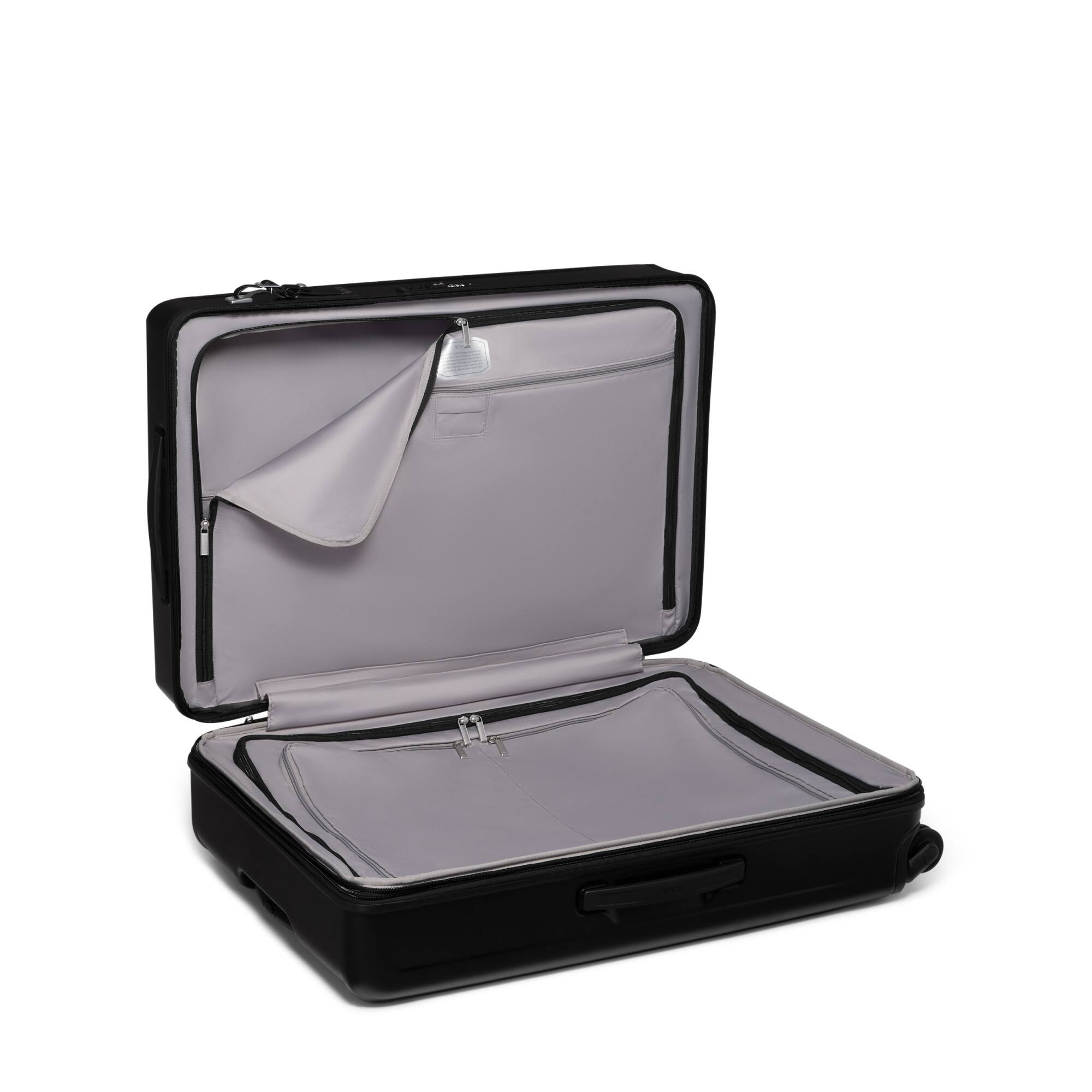 Angle. TUMI - Ventra Large Expandable Checked Spinner Suitcase - Black Texture.