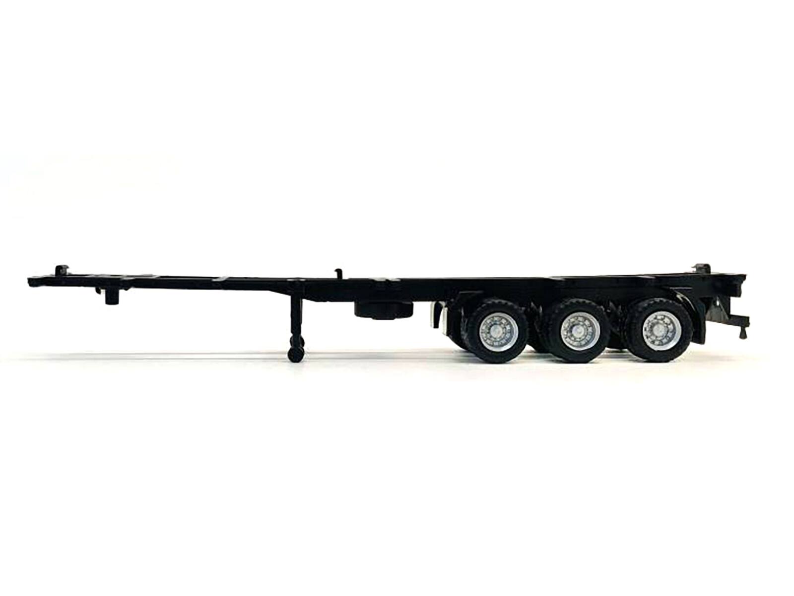 Angle. Promotex - Container Chassis for 3-Axle 40ft Trailer 1/87 (HO) Plastic Model by Promotex - Black.