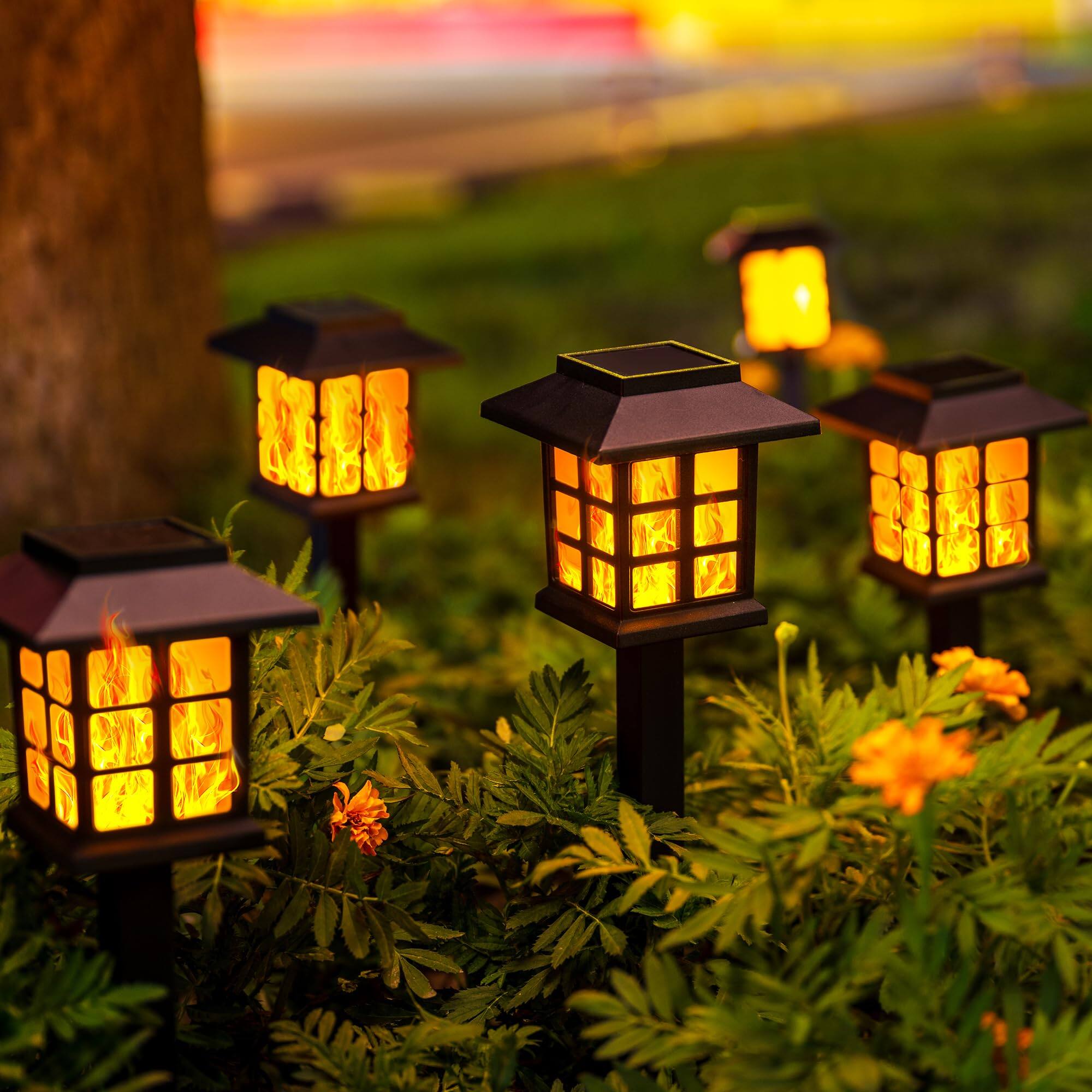 Angle. Dazzed Corner - 12-Pack Flickering Flame Solar Garden Lights, Waterproof, 10-Hour Glow - Black.