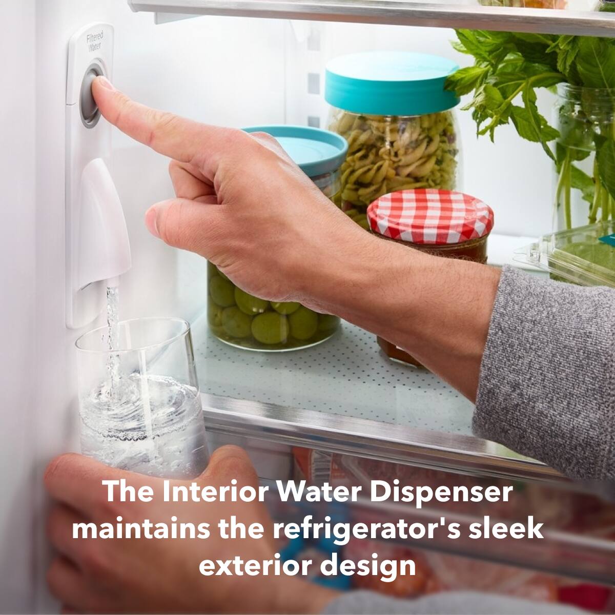 The Interior Water Dispenser maintains the refrigerator's sleek exterior design.