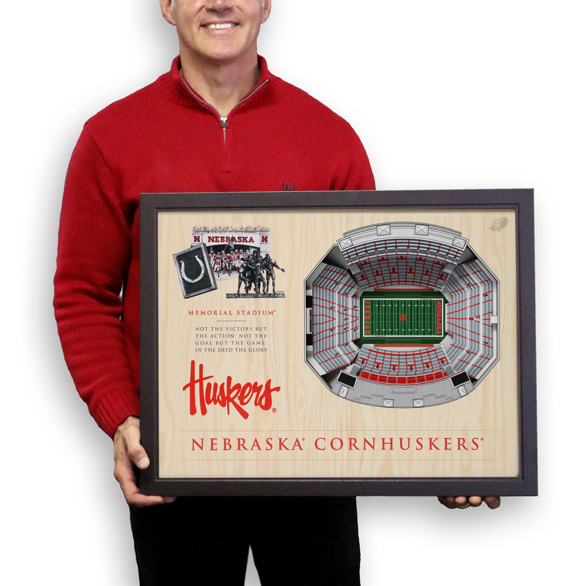 MEMORIAL STADIUM  
NOT THE VICTORY BUT THE ACTION; NOT THE GOAL BUT THE GAME; IN THE DEED THE GLORY  

Huskers  
NEBRASKA CORNHUSKERS