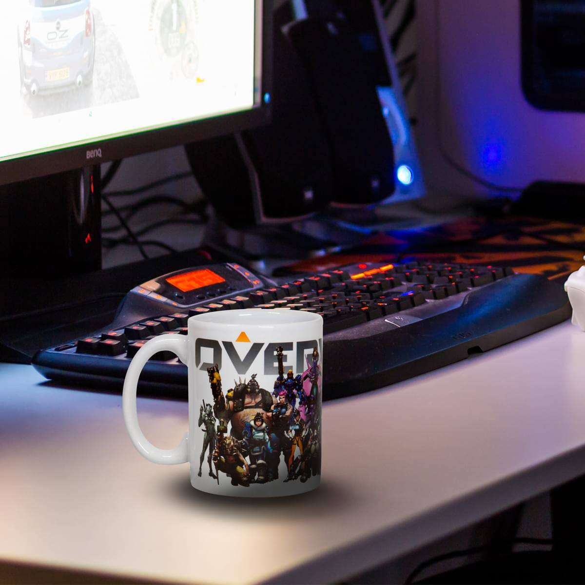 The text on the mug reads: "OVERWATCH"