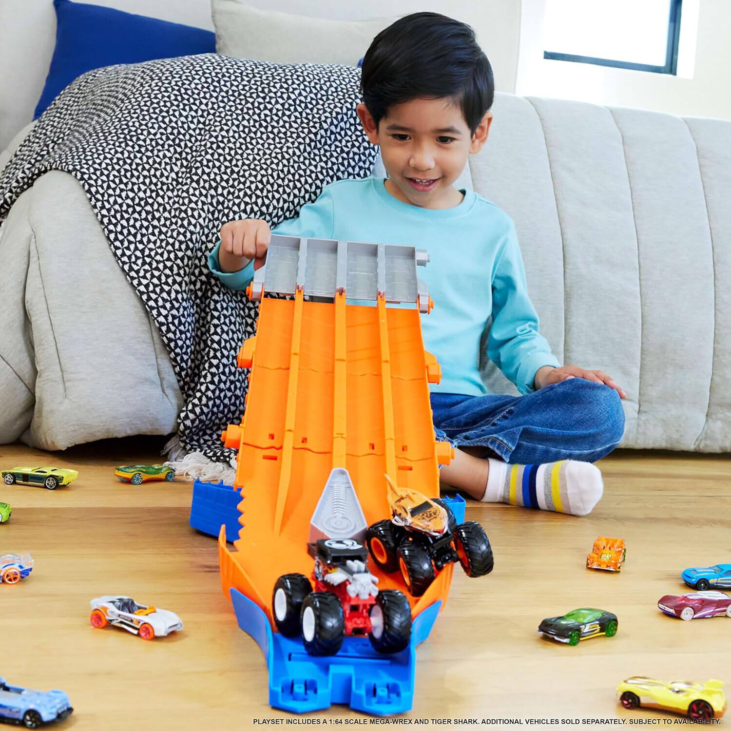 PLAYSET INCLUDES A 1:64 SCALE MEGA-WREX AND TIGER SHARK. ADDITIONAL VEHICLES SOLD SEPARATELY, SUBJECT TO AVAILABILITY.