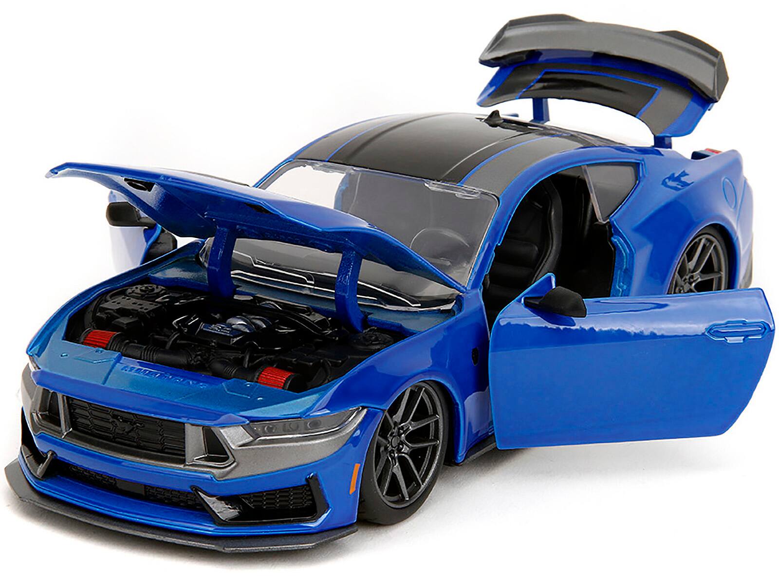 Angle. Jada - 2024 Ford Mustang Dark Horse Blue Metallic with Black and Gray Stripes "Bigtime Muscle" Series 1/24 - Blue Metallic With Black And Gray.