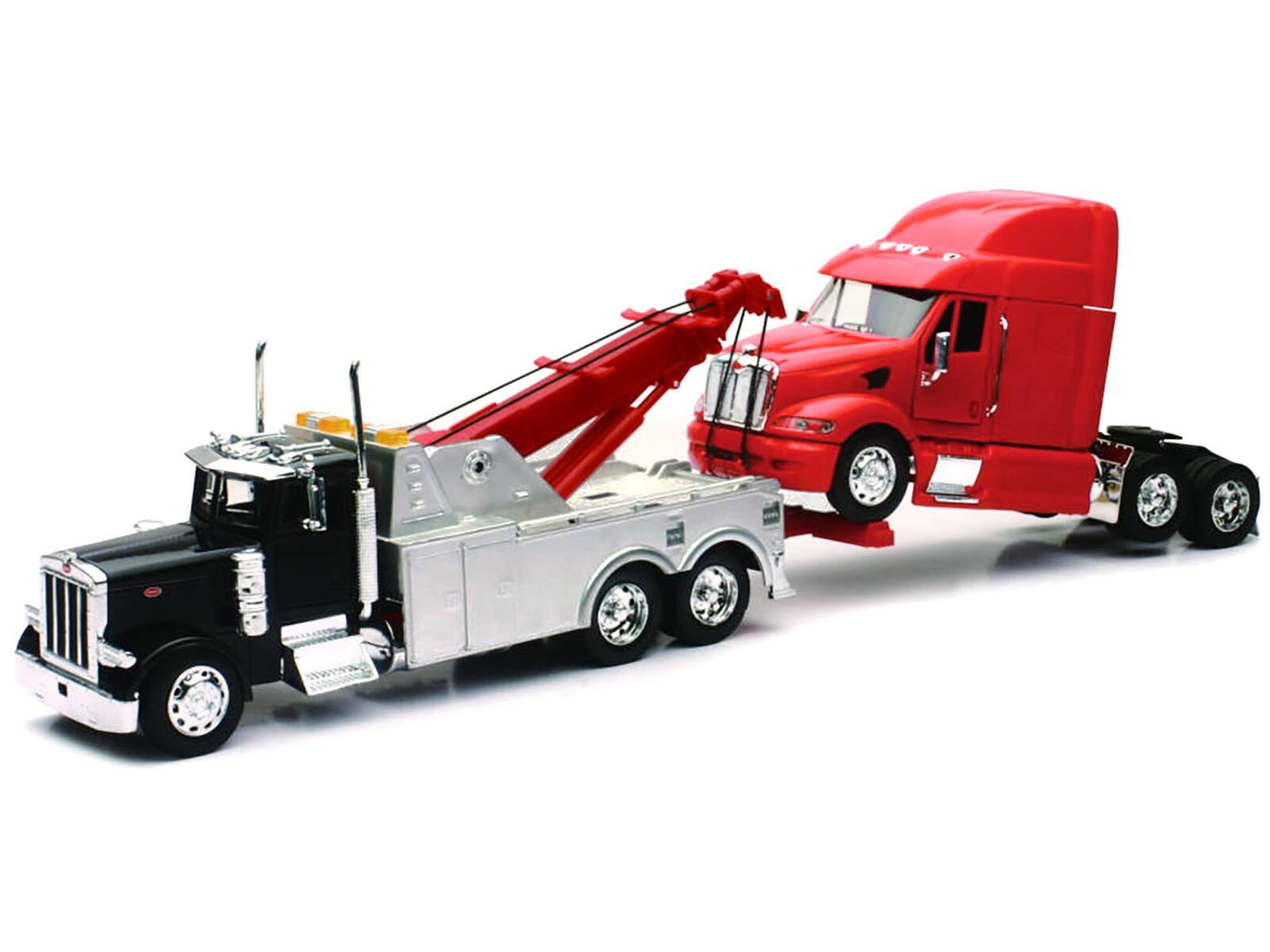 Angle. New Ray - Peterbilt 379 Tow Truck Black with Peterbilt 387 Truck Tractor Red Set of 2 pieces 1/32 Diecast Model by New Ray - Black, Red.