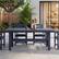 Left. Famapy - HDPE Outdoor Dining Table with Umbrella Hole & Cap-Solid Panel Patio Table for 8 People Weatherproof & Low Maintenance - Navy blue.
