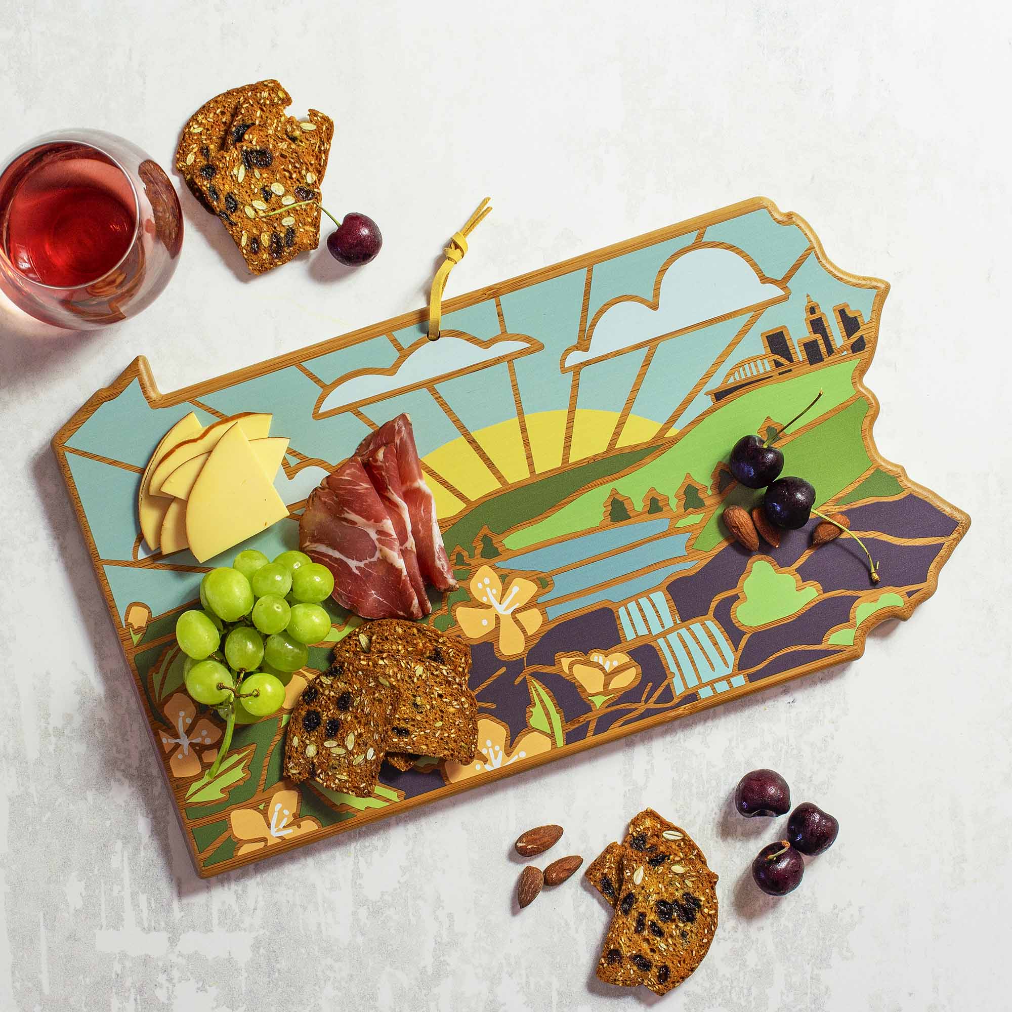 Angle. Totally Bamboo - Pennsylvania Cutting Board with Artwork by Summer Stokes.