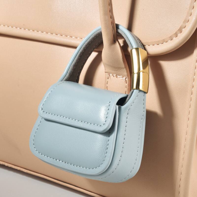 Alt View 4. Posh Tech - Mini Purse Charm for Airpods Pro®.