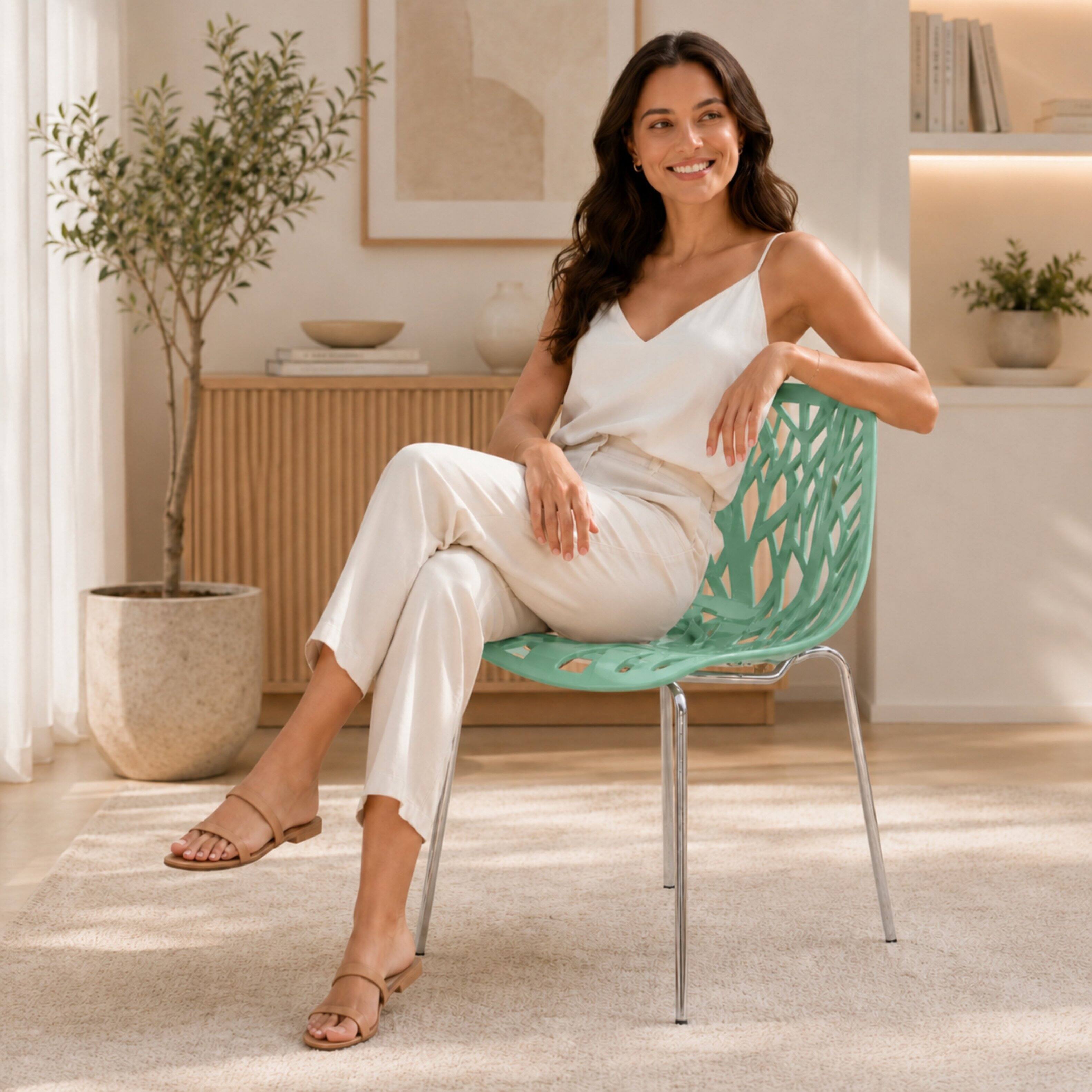 Angle. LeisureMod - Asbury Stackable Modern Dining Chair with Cut Out Design and Chrome Legs Side Chair for Home Living Room - Mint.