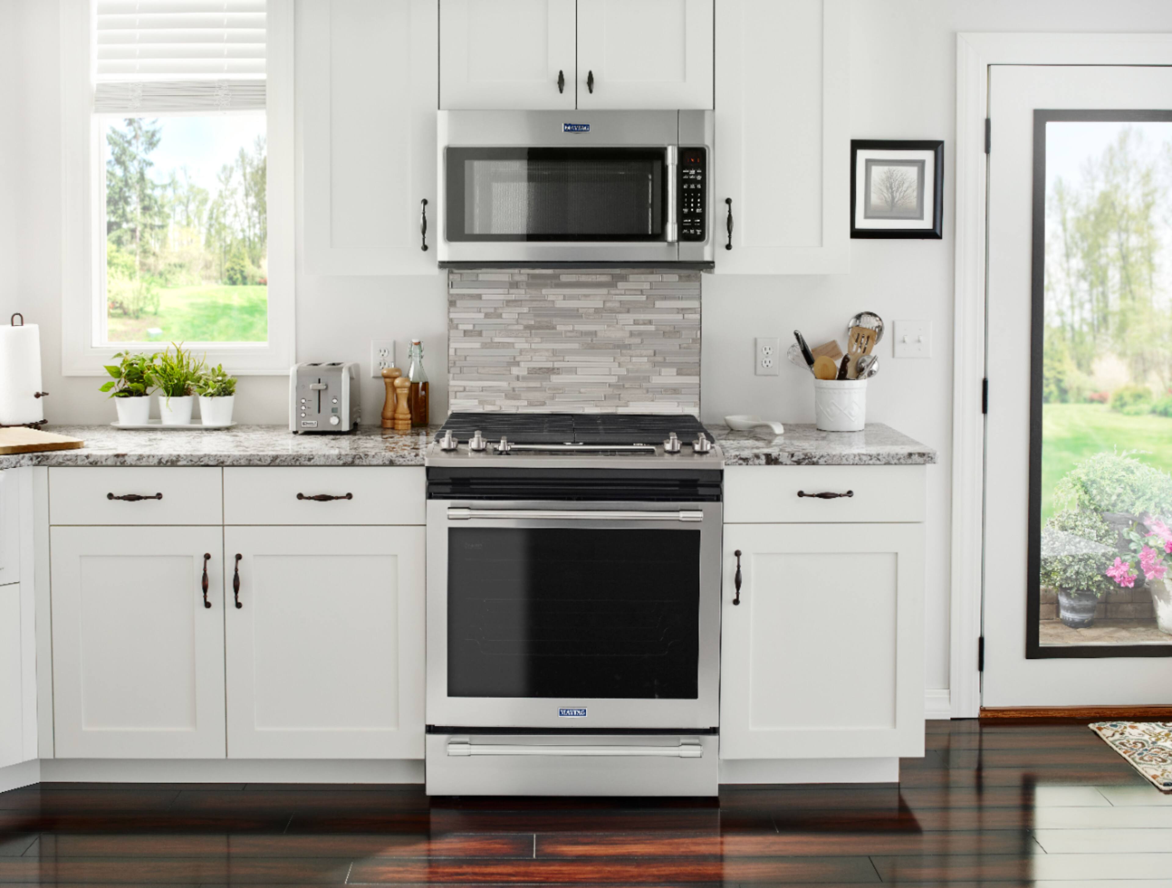 Alt View 22. Maytag - 5.8 Cu. Ft. Self-Cleaning Fingerprint Resistant Slide-In Gas Convection Range.