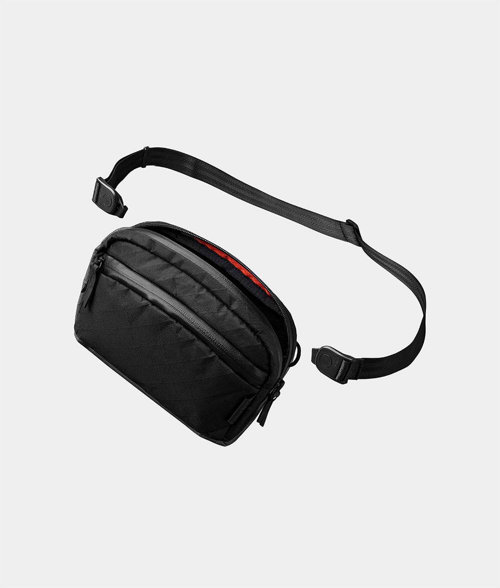 ALPAKA - Flight Sling 1L Travel Sling Bag, Lightweight Crossbody Pouch, Phone Sleeve, Passport Pocket, Detachable Strap - Black Ultradyne 100D price history on PriceWatchPro