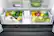Alt View 12. Samsung - 22.6 cu. ft. 4-Door Flex French Door Counter Depth Refrigerator with FlexZone Drawer - Black stainless steel.