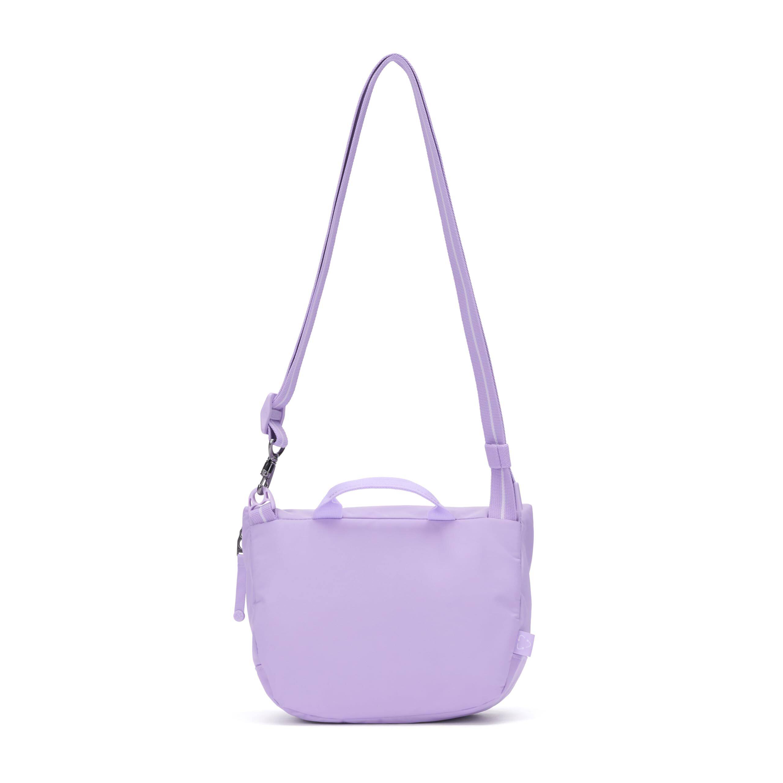 Left. Pacsafe - GO Saddle Crossbody - Lavender.