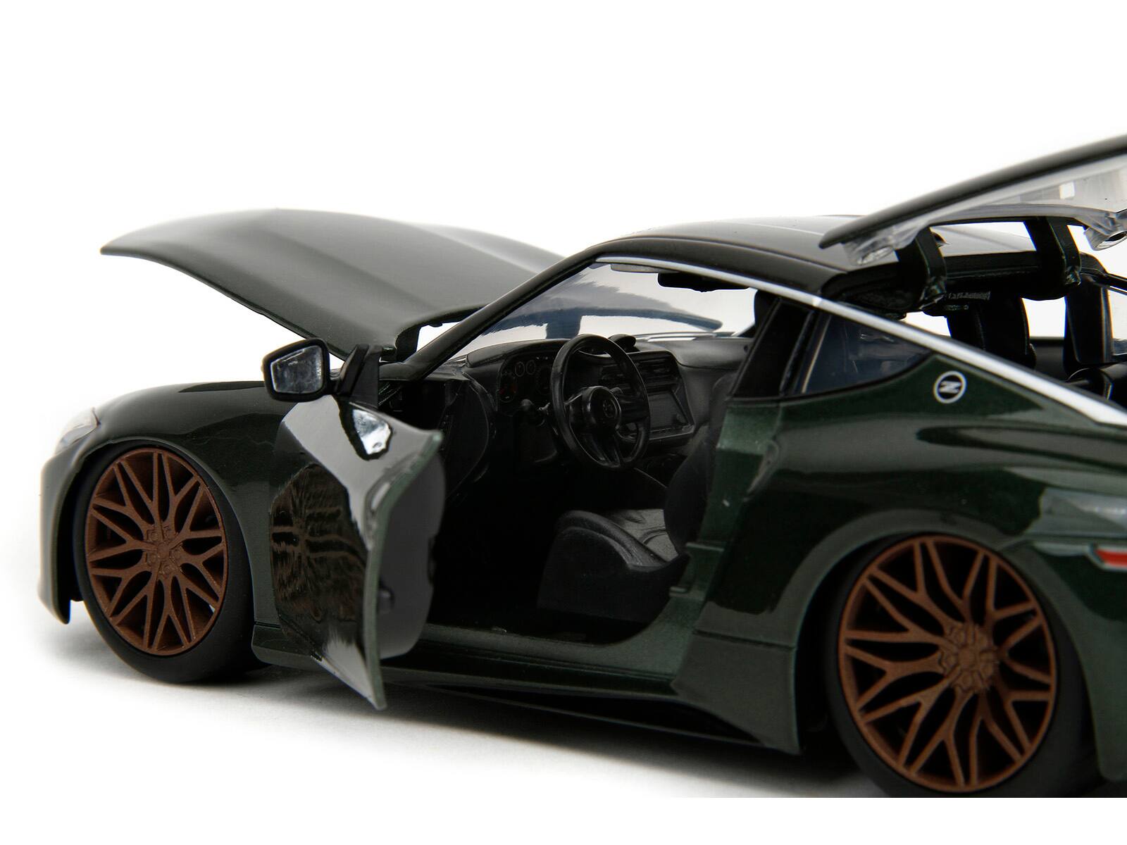 Left. Jada - 2023 Nissan Z Dark Green Metallic with Black Top "Fast X" (2023) Movie "Fast & Furious" Series 1/24 - Dark Green Metallic With Black.