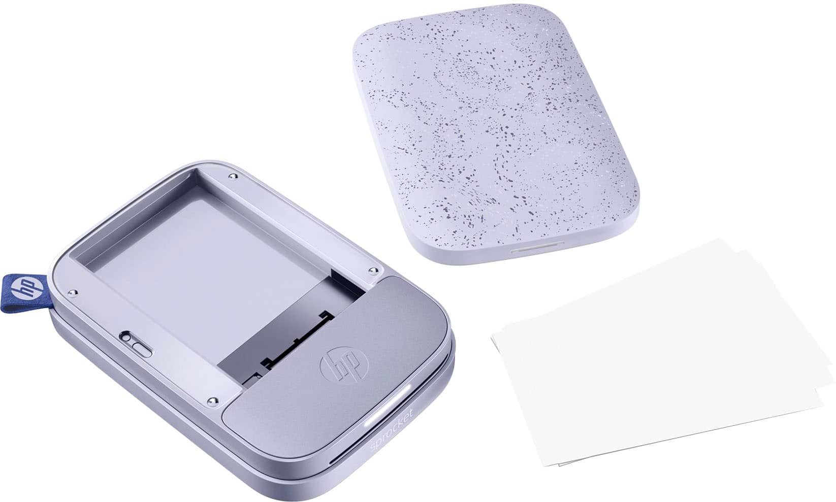 The image features a HP branded device, which appears to be a printer or a similar electronic device. The device is sitting on a white surface, and there are two pieces of paper nearby. One of the pieces of paper is a white envelope, while the other is a piece of paper with a purple design on it. The overall scene suggests that the device might be used for printing or processing these papers.