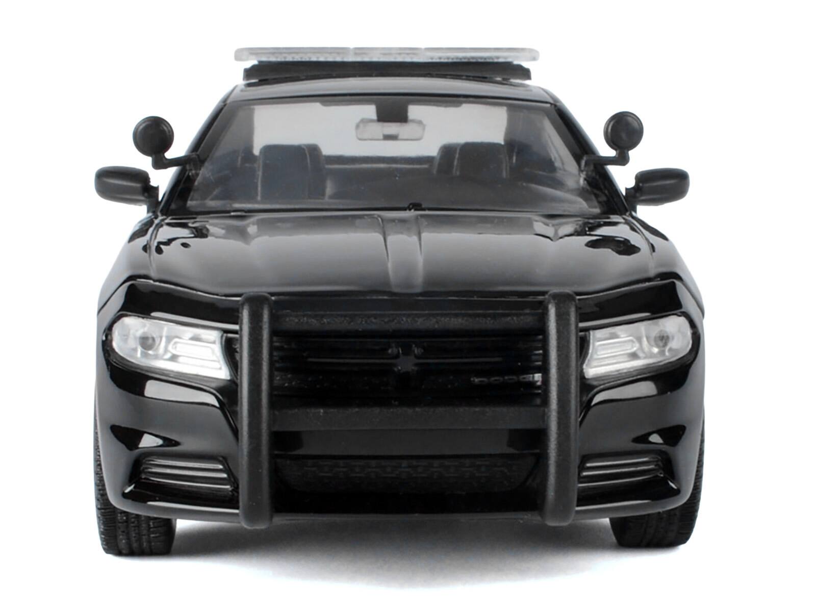 Alt View 1. Motormax - 2023 Dodge Charger Pursuit Police Car Black and White "Law Enforcement and Public Service" Series 1/24 - Black and White.