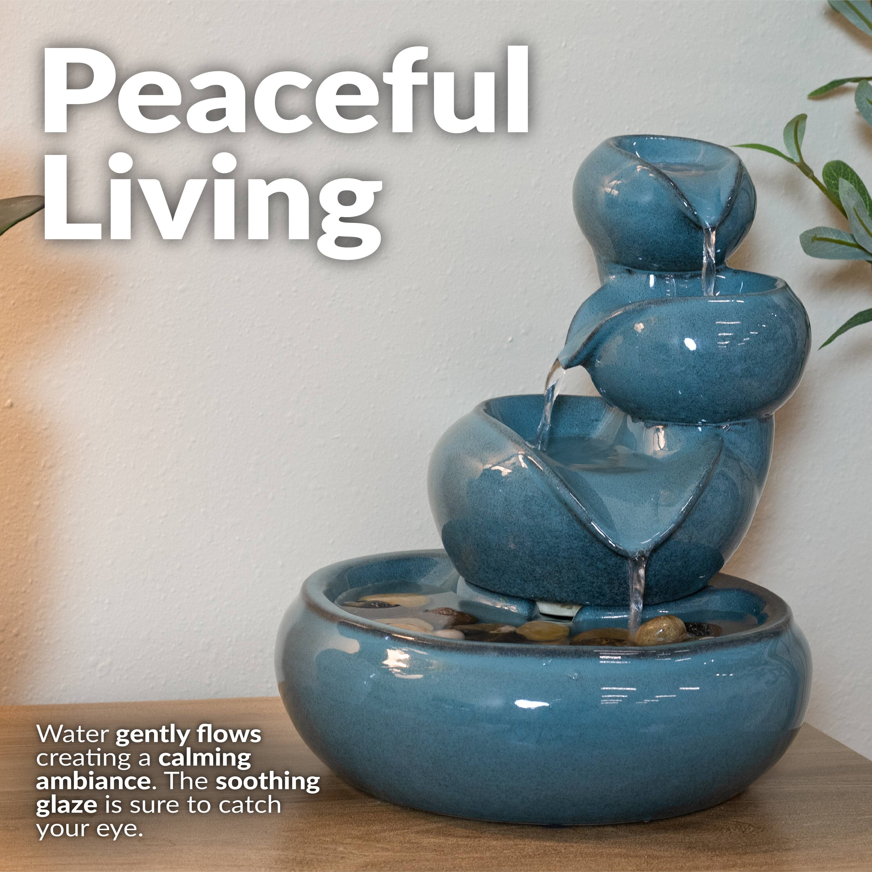 Peaceful Living

Water gently flows creating a calming ambiance. The soothing glaze is sure to catch your eye.