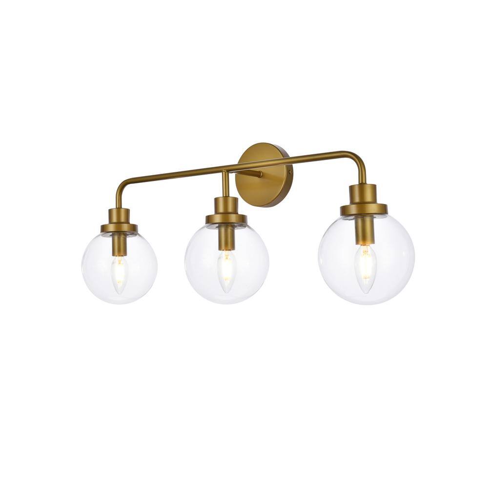 Alt View 2. Living District - Hanson 3 lights bath sconce in brass with clear shade - Brass And Clear Shade.