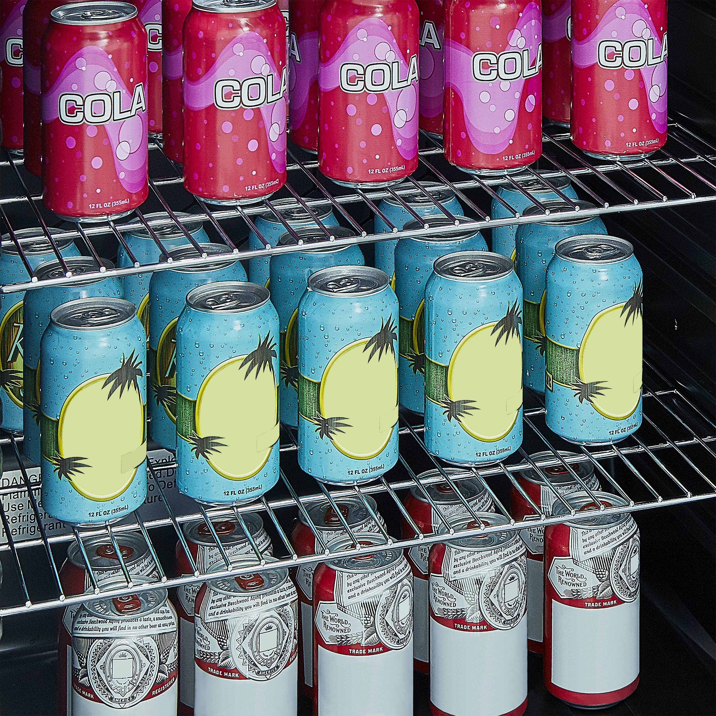 Coca-Cola 12 FL oz (303ml) cans are displayed in a cooler. There are a total of 12 cans, with some of them being pink and others being blue. The cans are arranged in a neat row, showcasing the variety of flavors available.