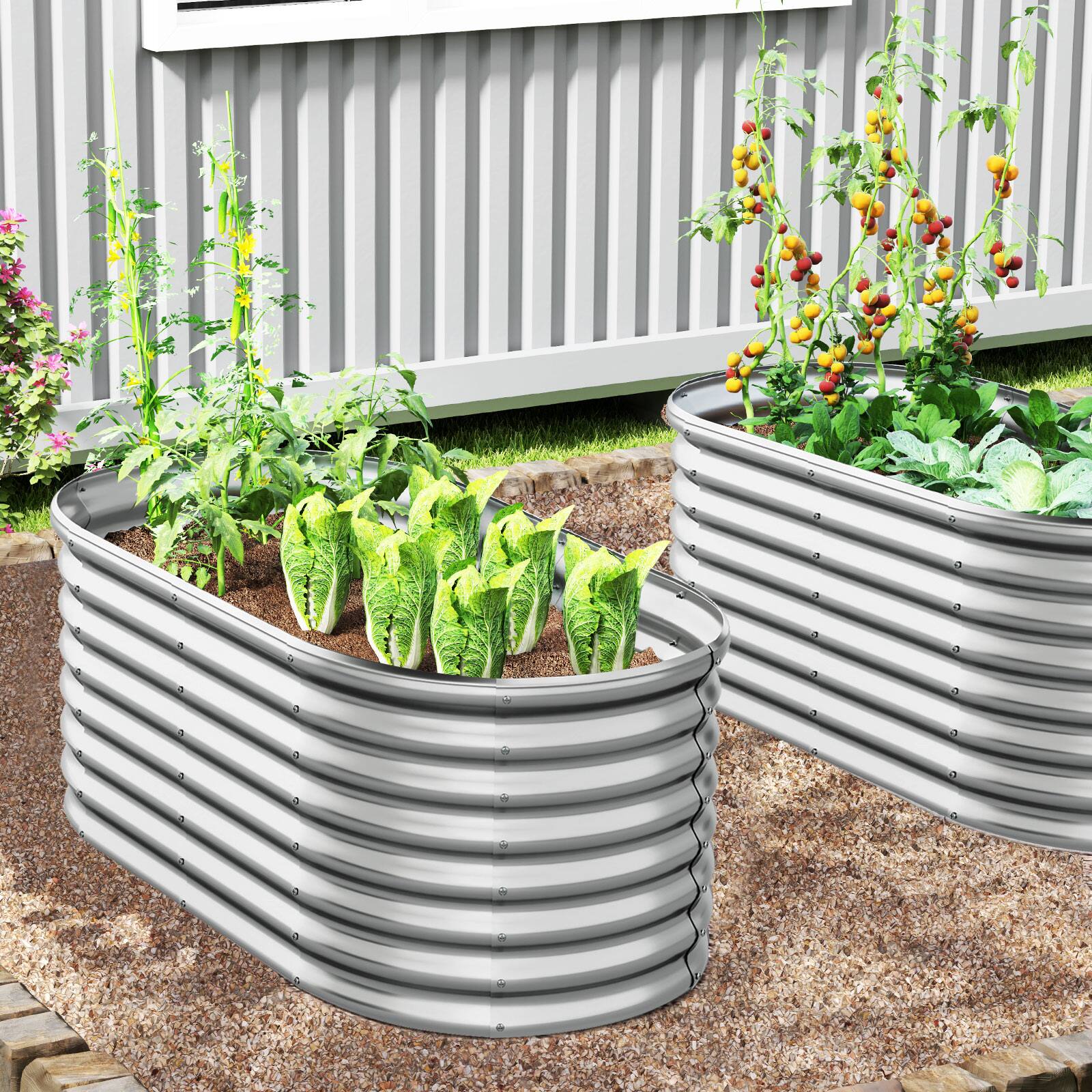 Angle. SlickBlue - Outdoor Oval Metal Raised Planter Bed, 5x3x2 ft with Open Base - Silver.