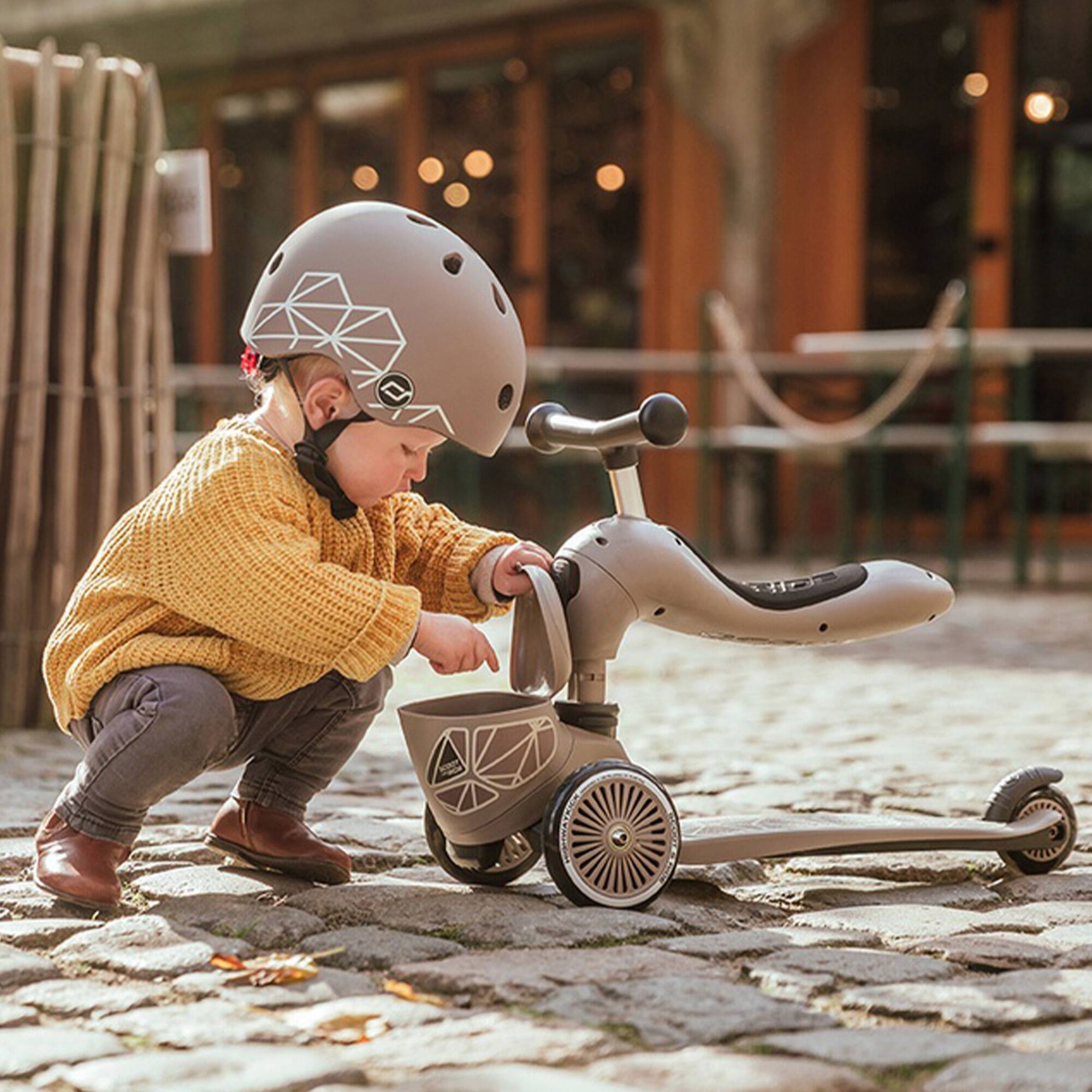 Alt View 3. Scoot & Ride - Scoot & Ride 2-in-1 Kids Scooter with Basket, Highwaykick 1 Lifestyle, Brown - Brown Lines.