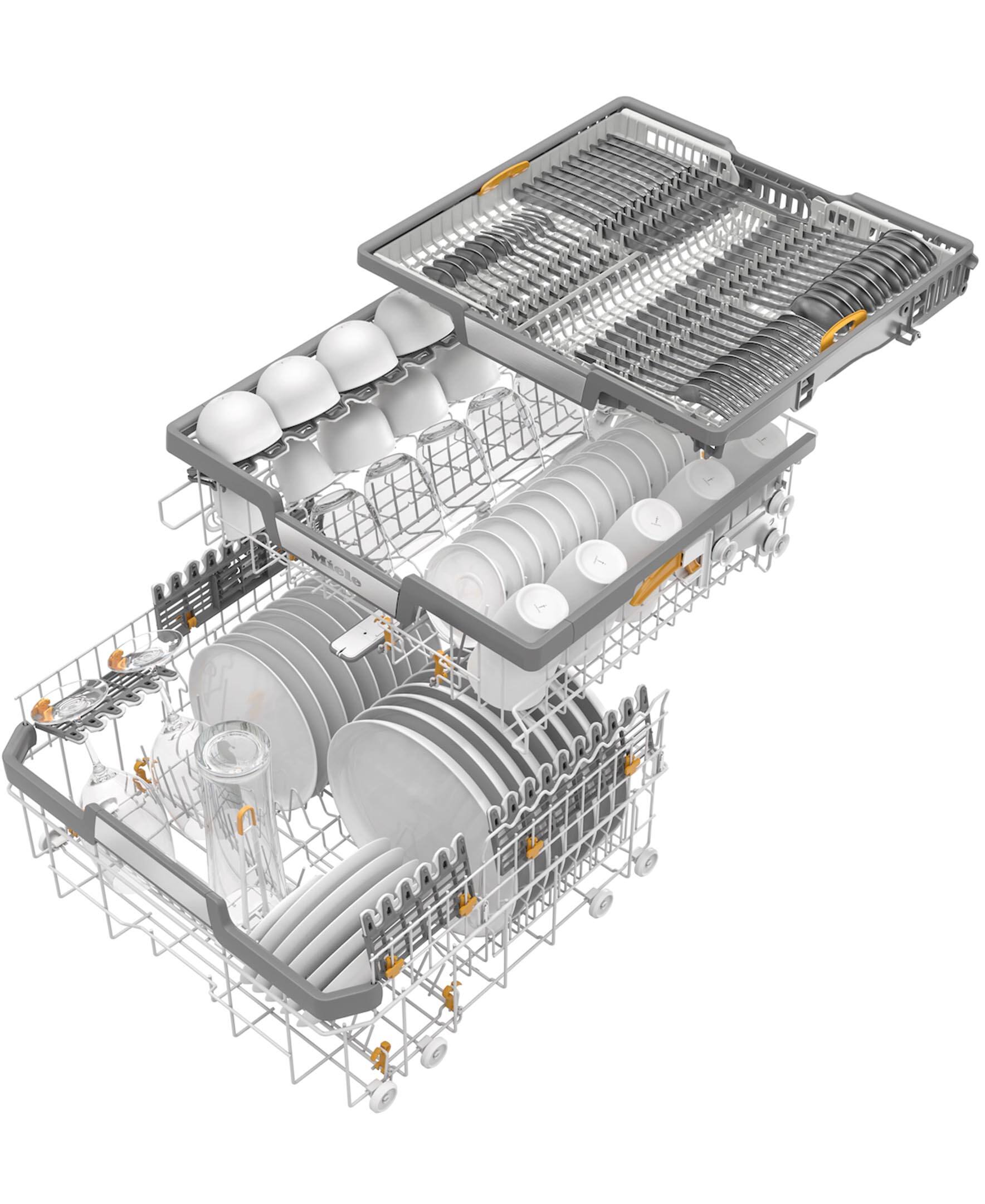 The dishwasher is full of dishes, including cups, bowls, and bottles. The dishes are arranged in various racks and compartments within the dishwasher, ready to be washed.