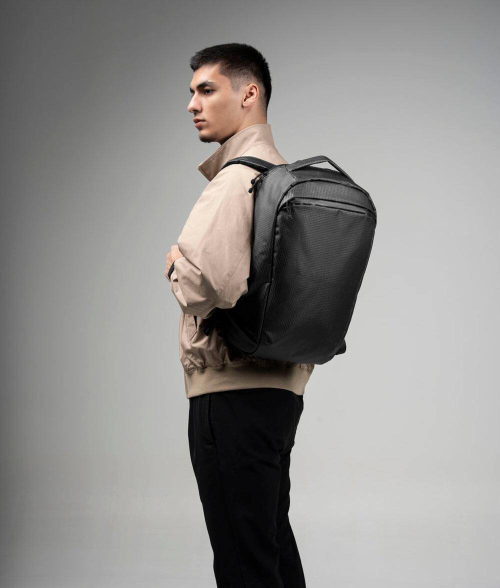 Angle. ALPAKA - Lightweight 22L Laptop Backpack for 16-inch Laptop, Momentum Backpack for Work, Travel & Commuting, Weather-Resistant - Axodyne hybrid Black.