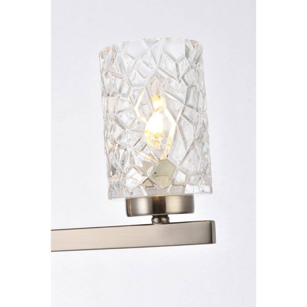 Left. Living District - Cassie 3 lights bath sconce in satin nickel with clear shade - Satin Nickel And Clear Shade.