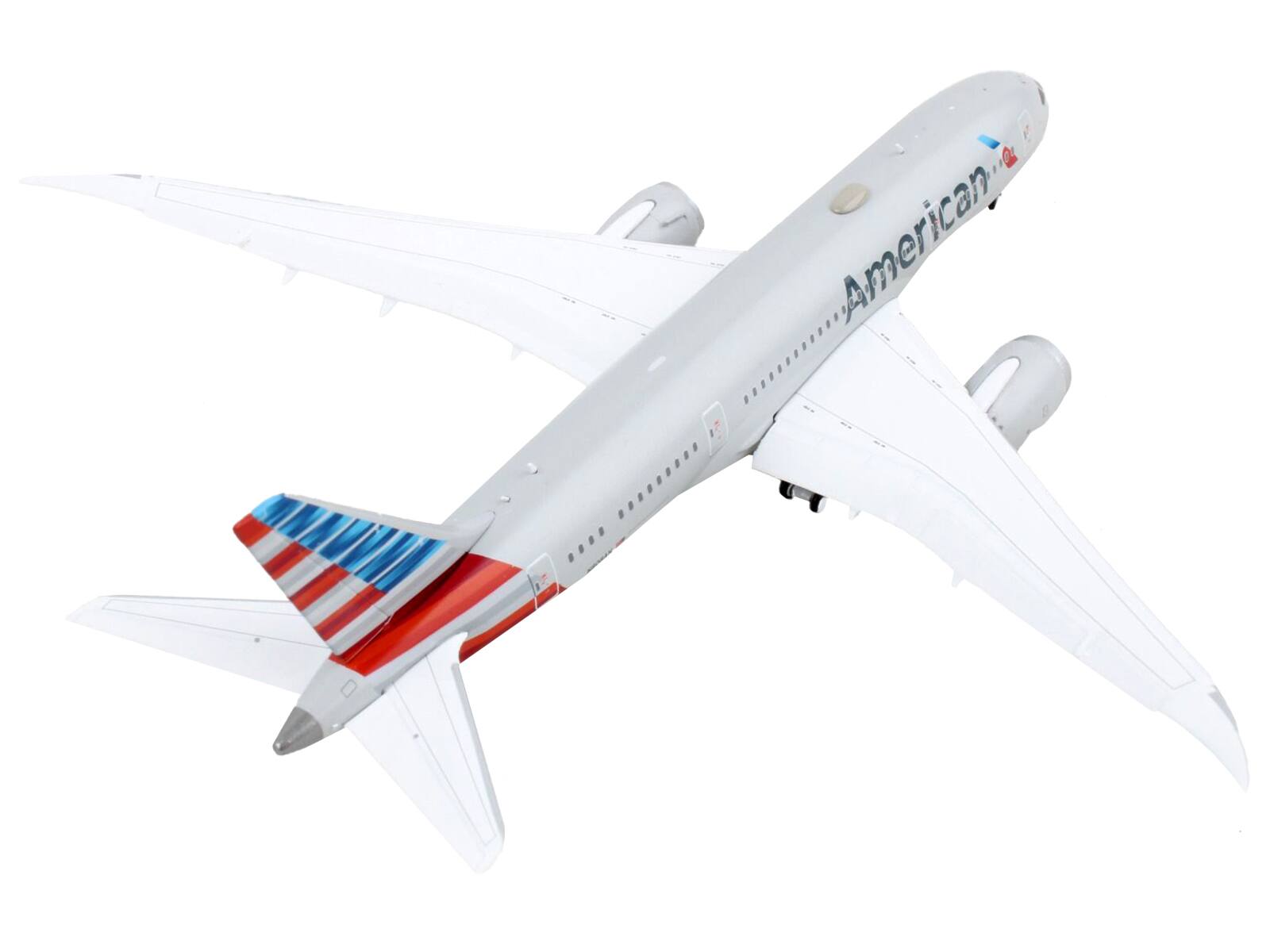 Left. GeminiJets - Boeing 787-8 Commercial Aircraft with Flaps Down American Airlines Gray with Striped Tail 1/400 Diecast Model Airplane - Gray.
