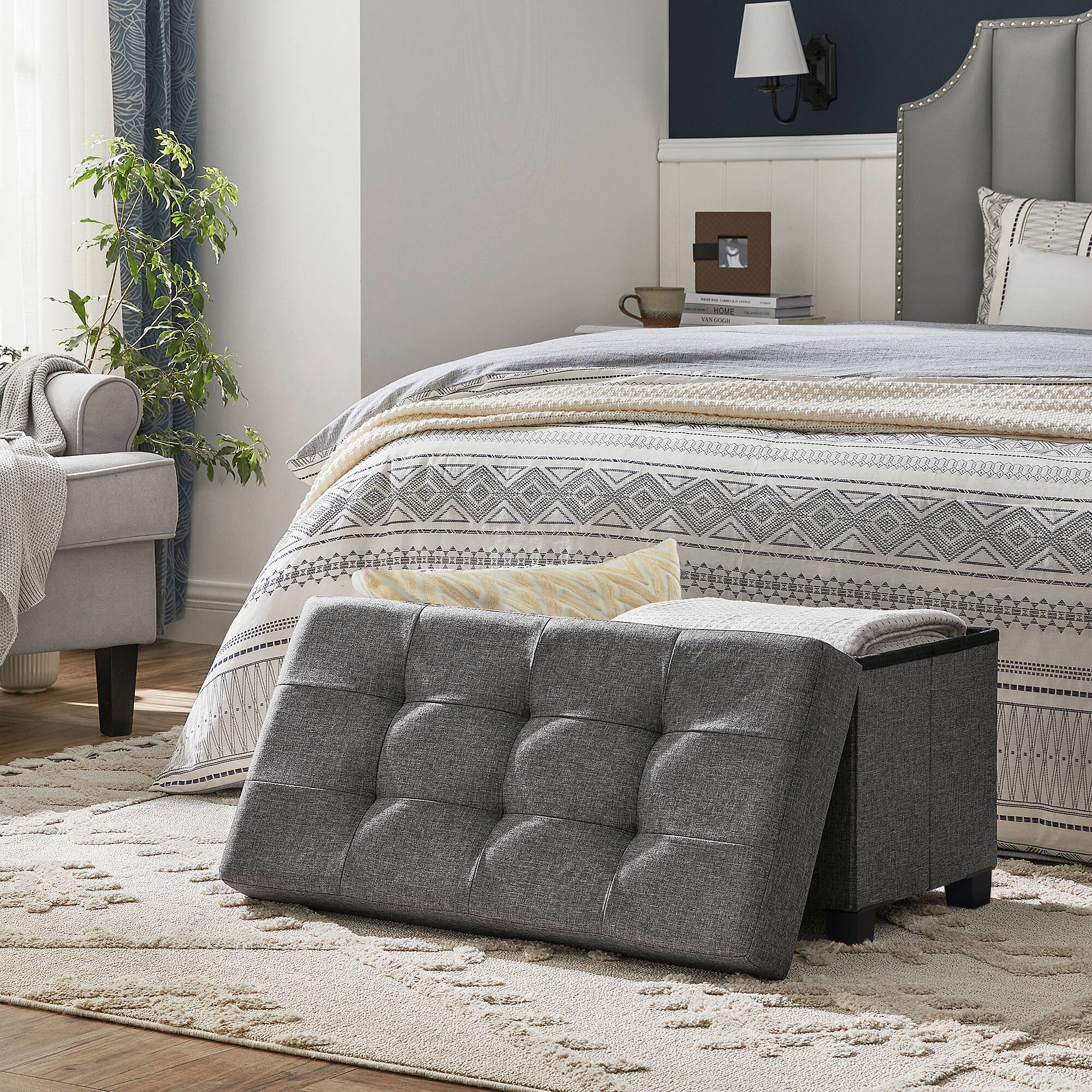 Angle. Songmics Home - Storage Ottoman Bench, Foldable Foot Rest with Legs,End of Bed Bench, Storage Chest, Load up to 660 lb, for Living Room - Dark Gray.