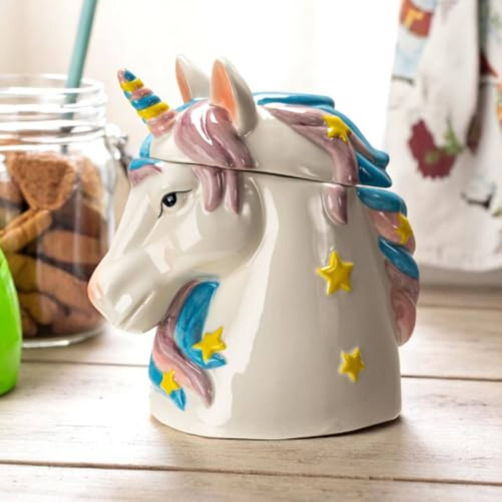 Angle. Pacific Trading - Magical Unicorn Ceramic Cookie Jar, White with Pink and Blue Mane, Yellow Stars, Decorative Kitchen Storage Container - White.