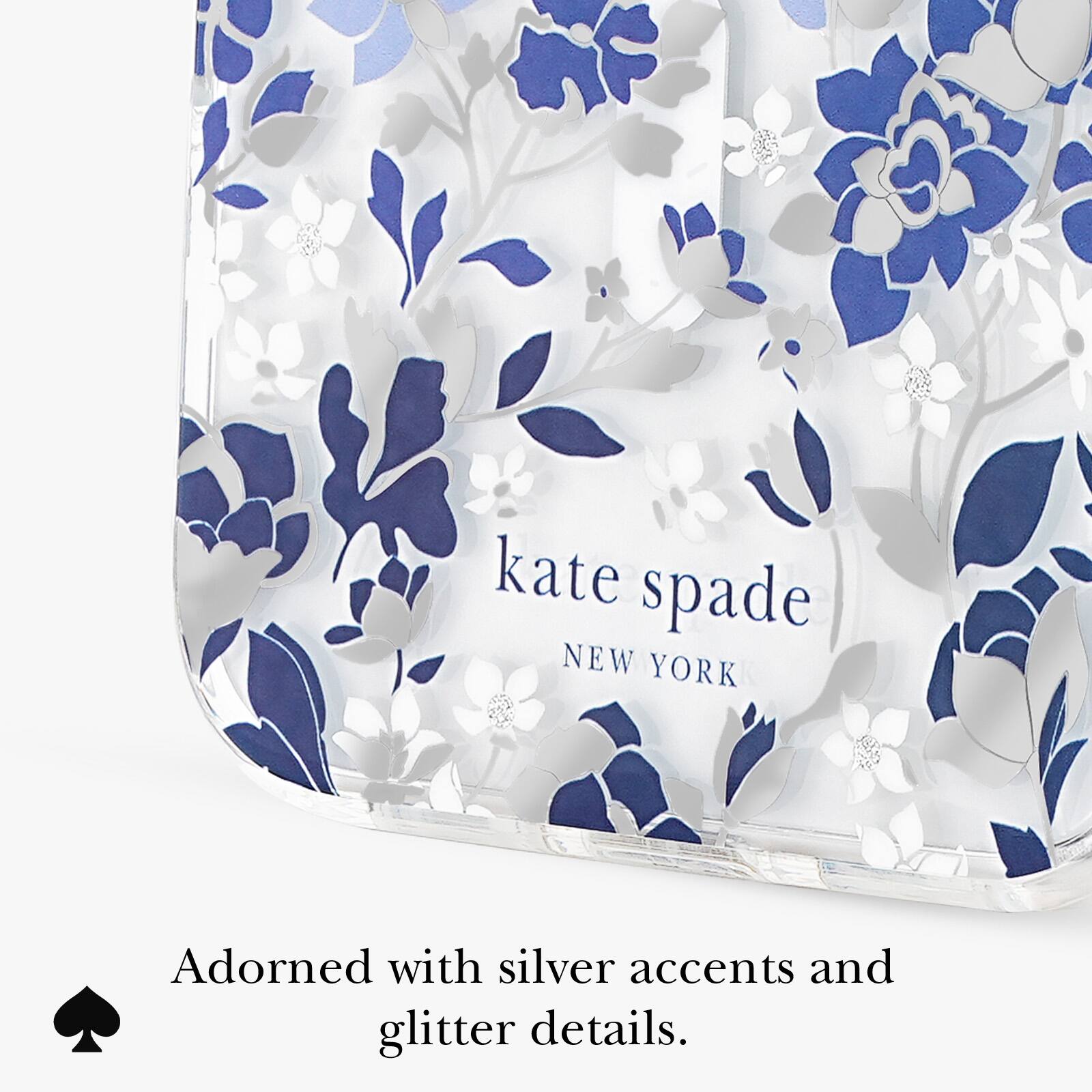 kate spade NEW YORK  
Adorned with silver accents and glitter details.