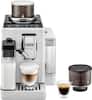 The image shows a white coffee maker with a glass of coffee and a cup of coffee beans. The coffee maker is a DeLonghi Riveglio B8.
