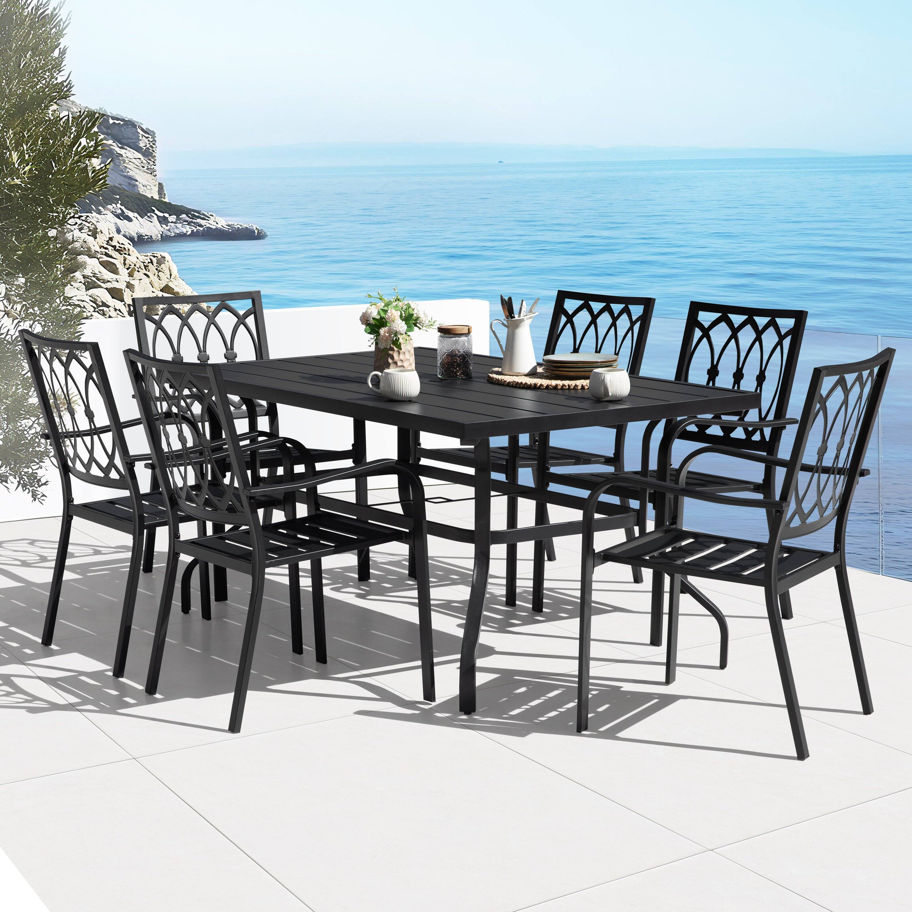 Angle. Nuu Garden - 7-Piece Metal Outdoor Dining Set with Umbrella Hole and 6 Stackable Chairs - Black.
